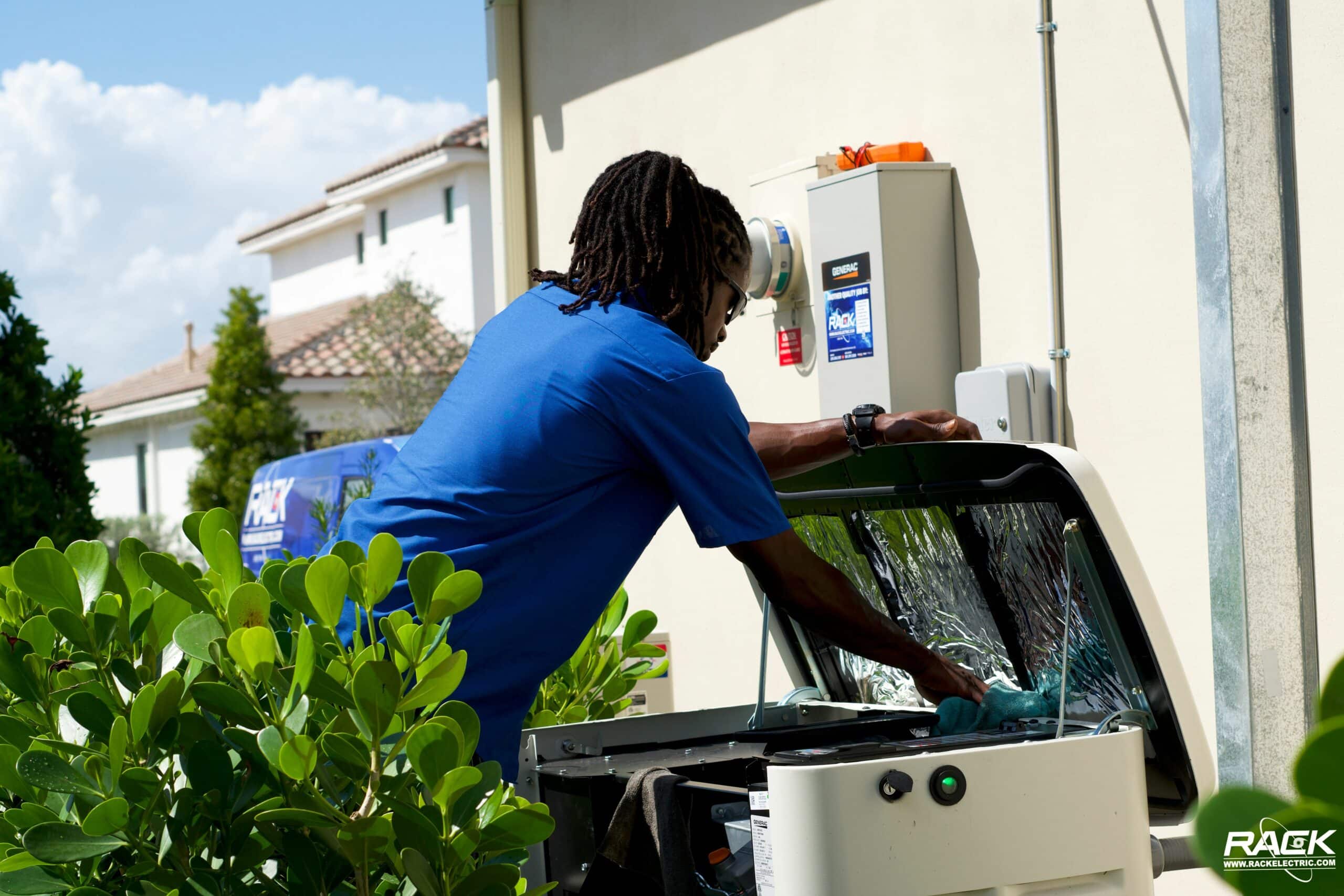 rack electric technician inspecting generator in south florida